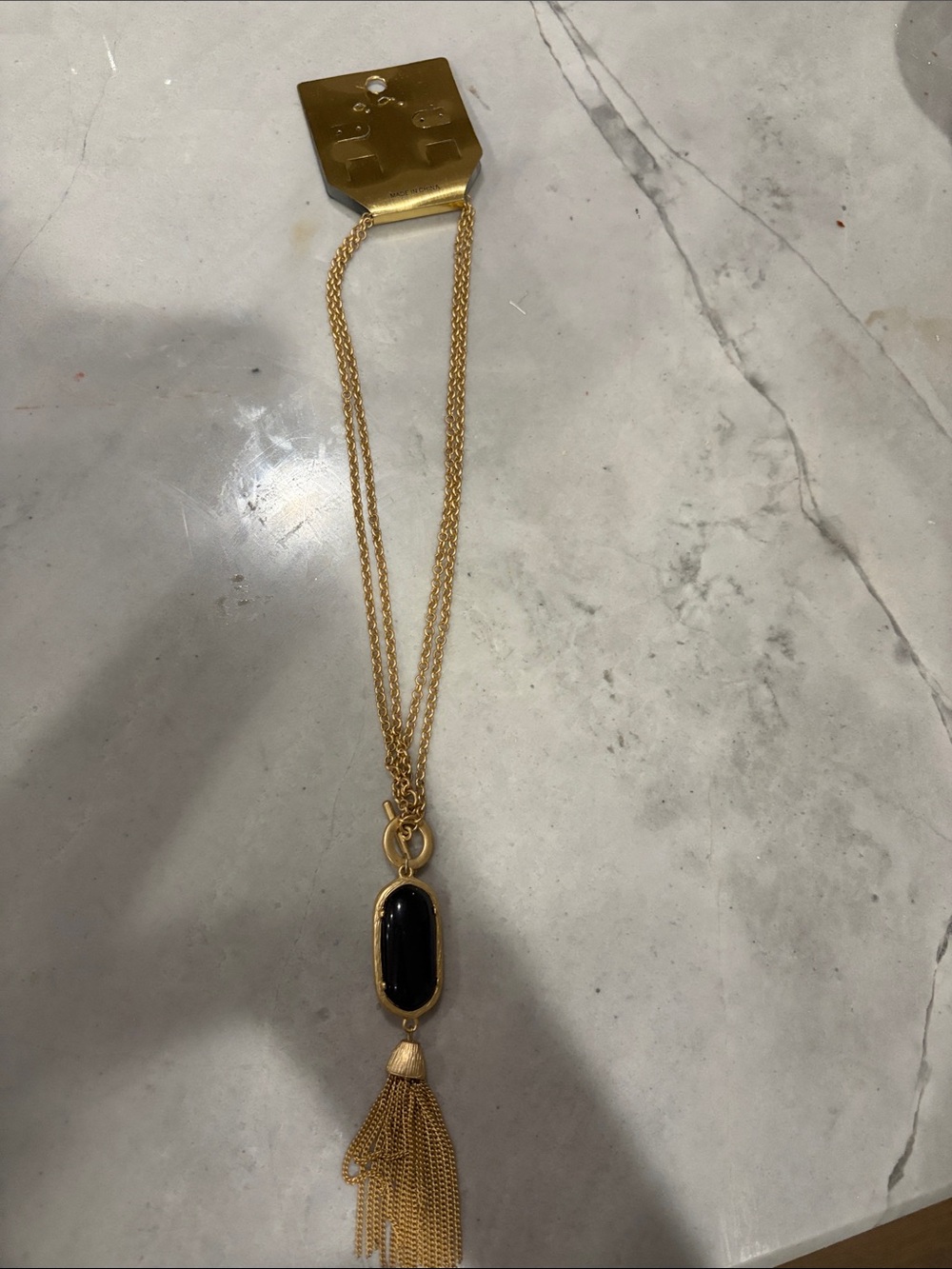 Gold Tassel Pendant Necklace with Black Stone